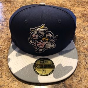 Wisconsin Udder Tuggers New Era 59Fifty fitted cap. 7 1/8